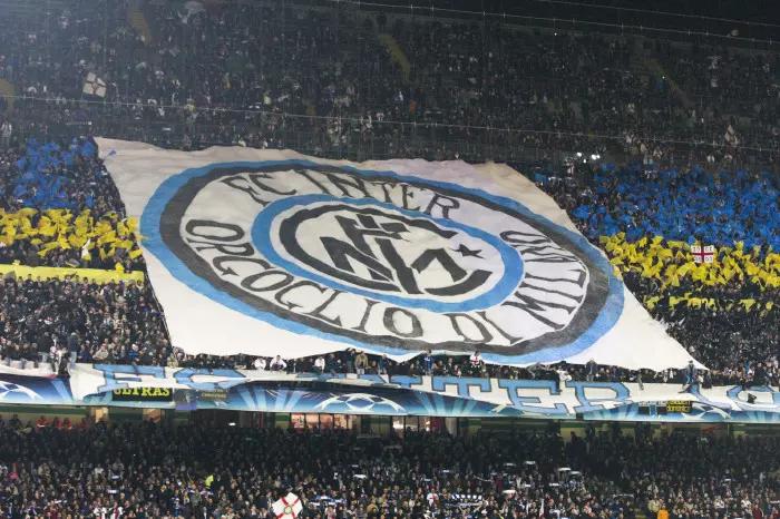 A tifo of the Inter Milan crest held by supporters