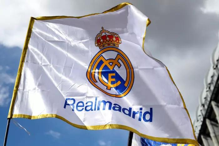 The crest of Real Madrid emblazoned on a flag