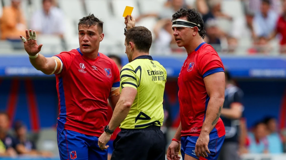 Referee Paul Williams shows the yellow card to Alfonso Escobar of Chile during the Rugby World Cup France