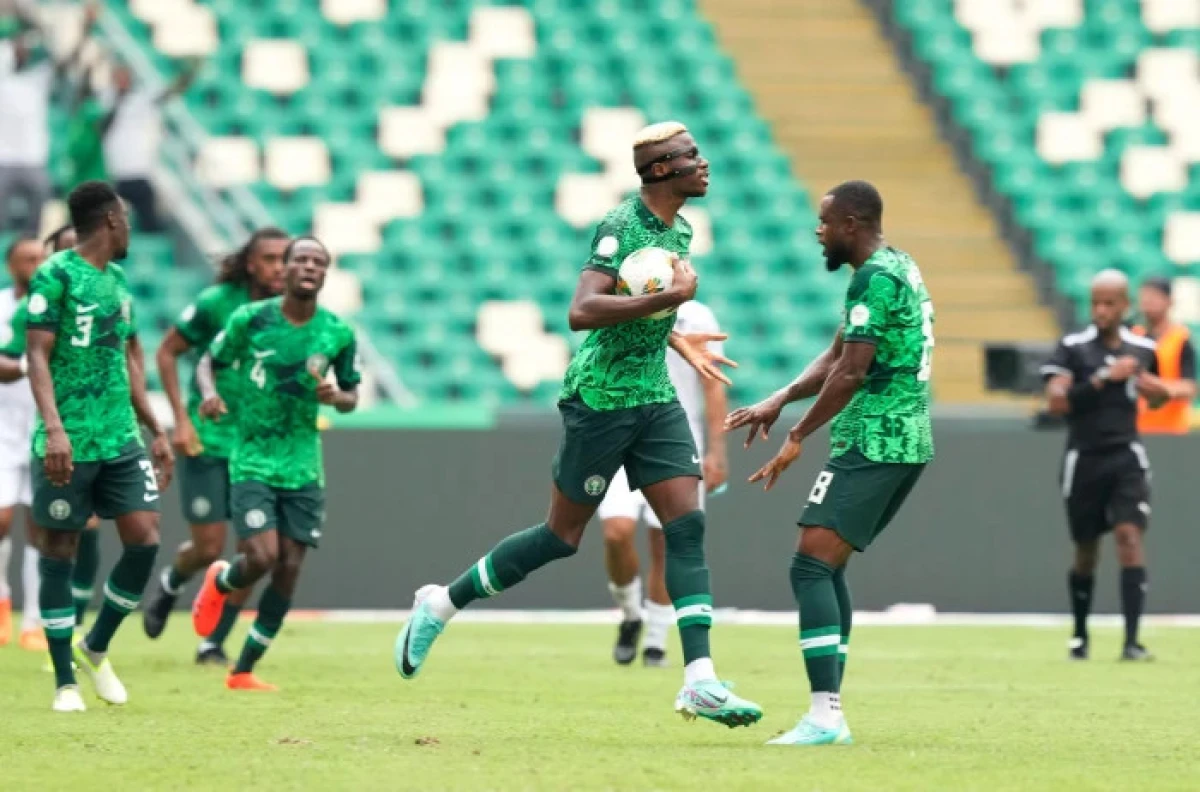 Victor Osimhen celebrates as he scores in Nigeria's AFCON opener against Equatorial Guinea