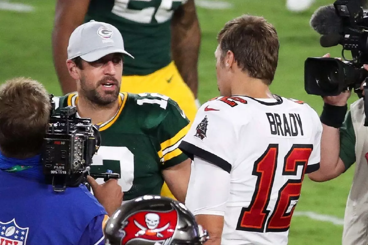 NFL legends Aaron Rodgers and Tom Brady in action
