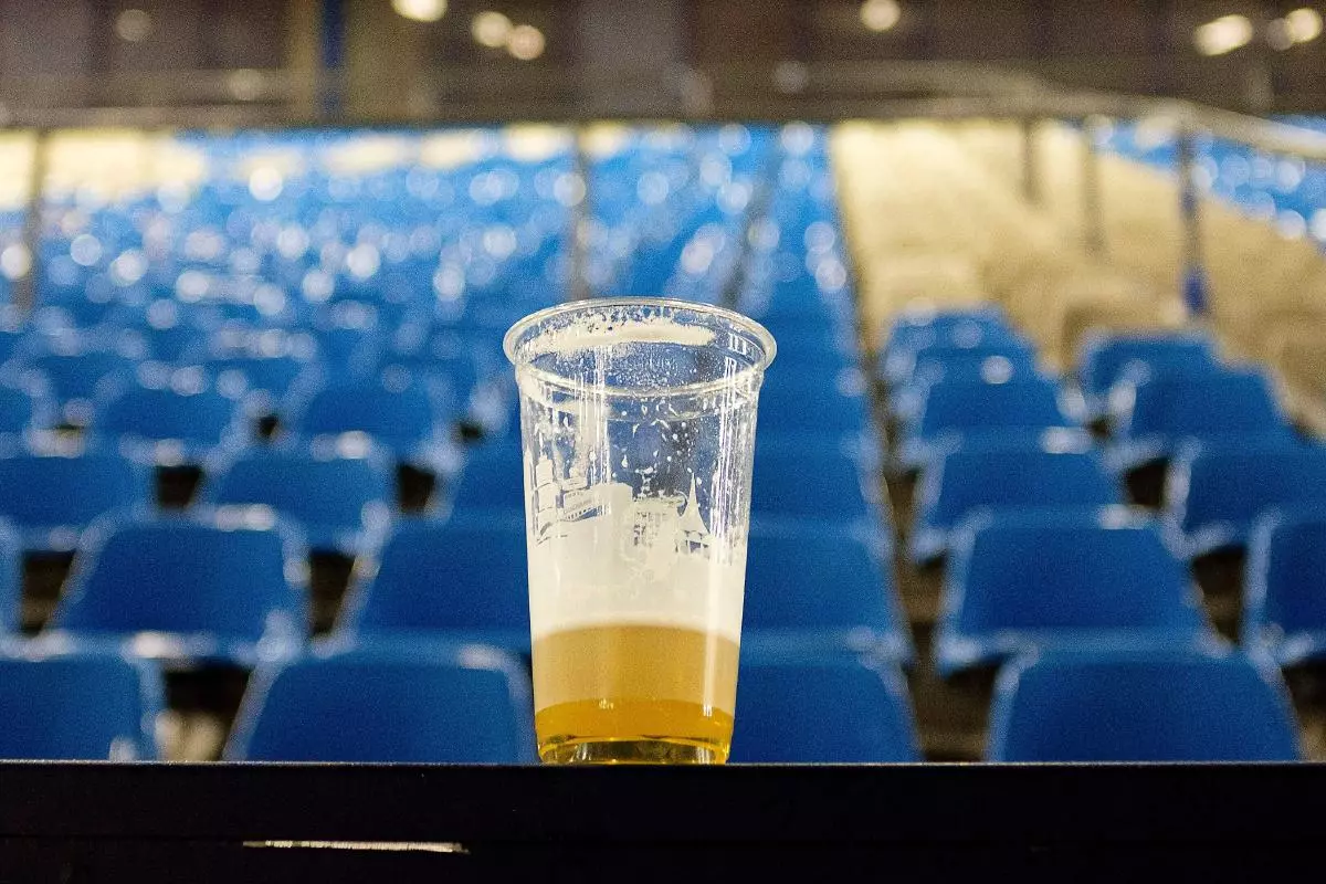 A beer mug 1/3 full at a Bundesliga game