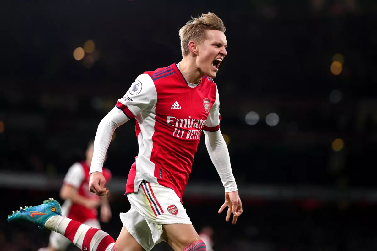 Arsenal's Martin Odegaard celebrates Alexandre Lacazette's (not pictured) goal, their side's second of the game during the Premier League match at Emirates Stadium, London. 