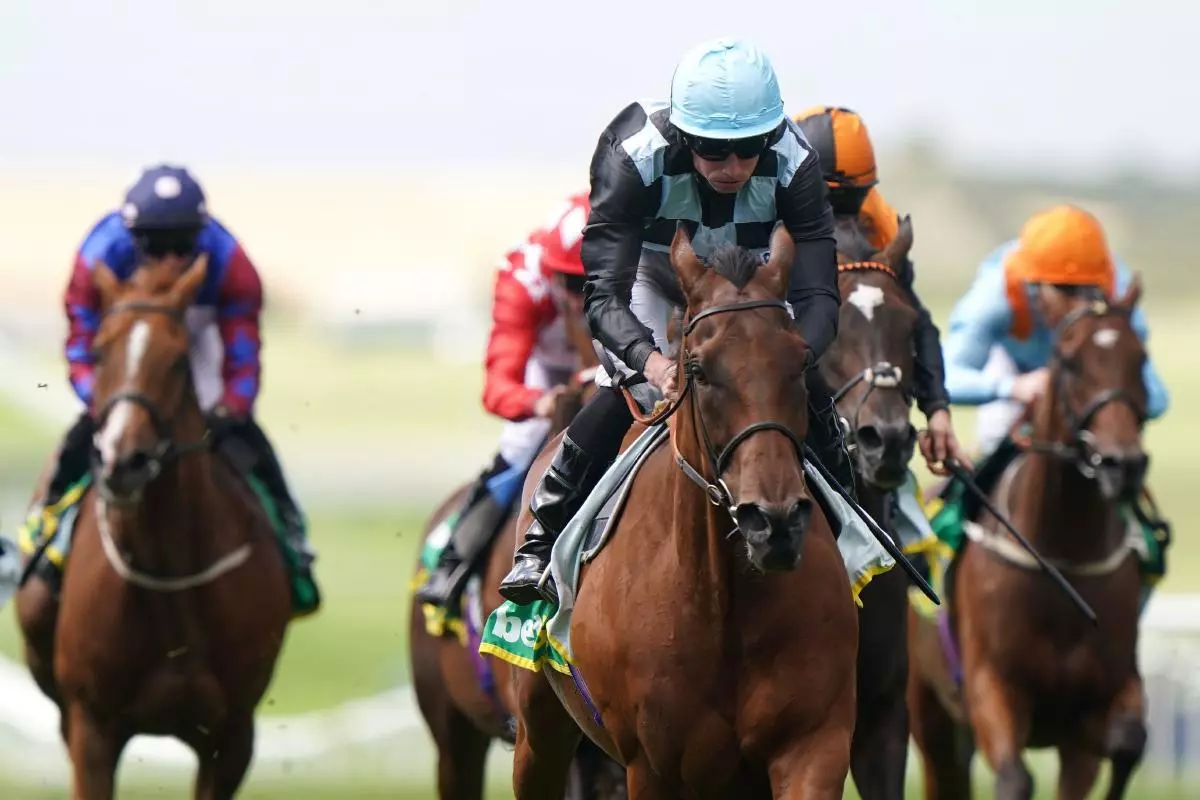 Biggles ridden by Ryan Moore at Newmarket