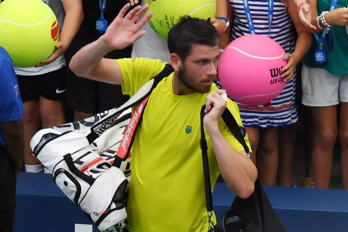 Cameron Norrie waves goodbye to US Open