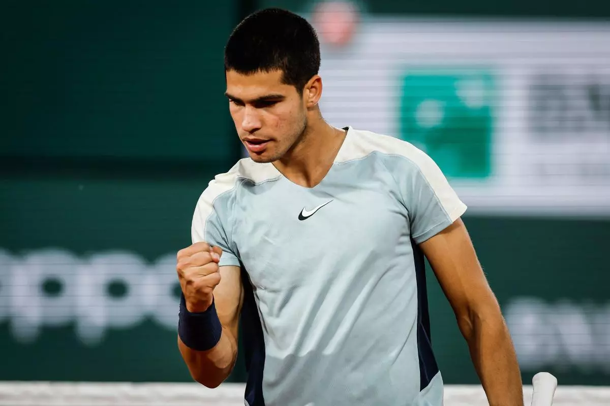 Carlos Alcaraz celebrates at French Open