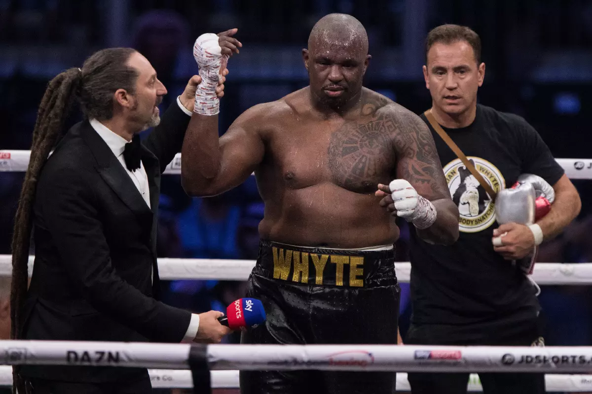 British professional boxer Dillian Whyte celebrates 