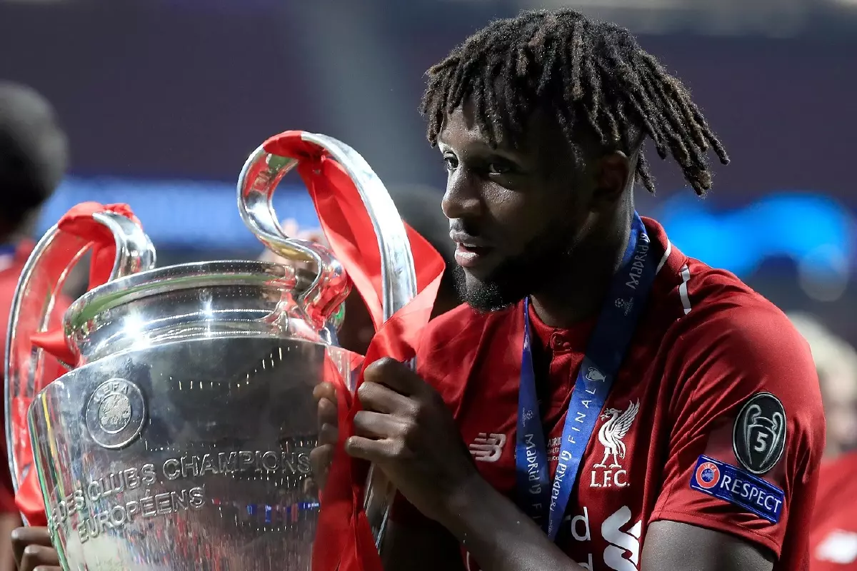 Divock Origi with the Champions League trophy