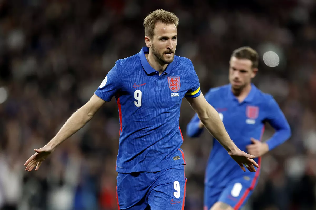 England's Harry Kane celebrates scoring his side's second goal from the penalty spot during the Alzheimer's Society international match at Wembley Stadium, London.