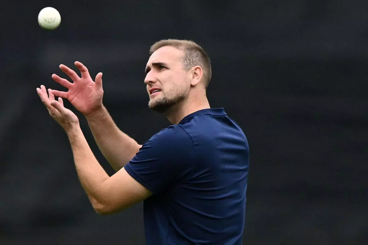 England's Liam Livingstone warms up