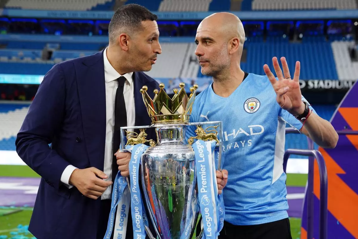 Manchester City manager Pep Guardiola and chairman Khaldoon Al Mubarak 