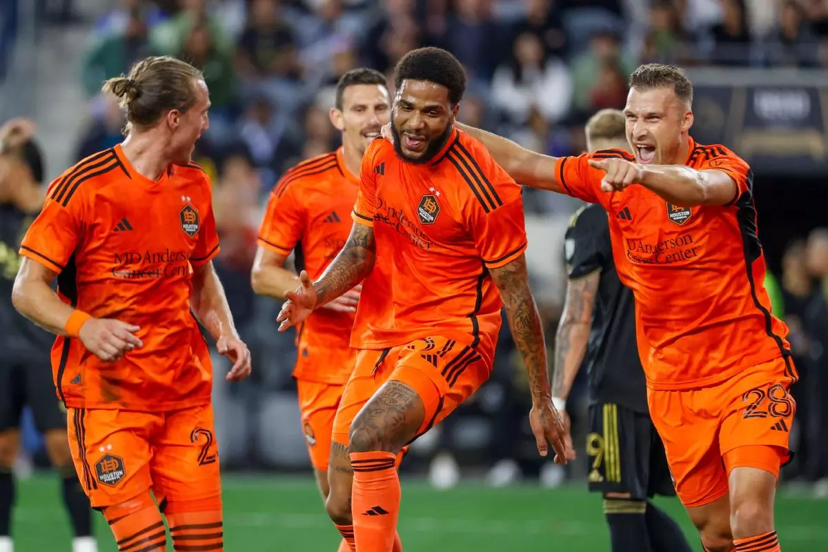 Micael celebrates a Houston Dynamo goal