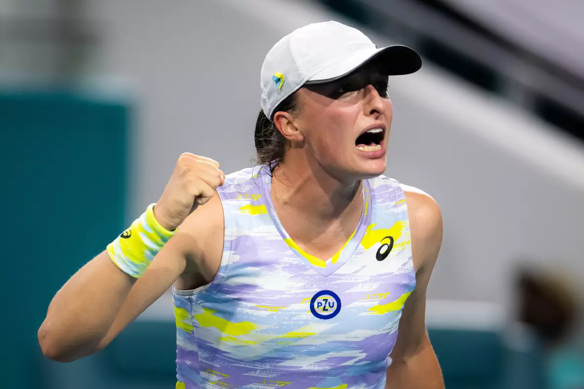 Iga Swiatek of Poland in action against Jessica Pegula of the United States during the semi-final of the 2022 Miami Open