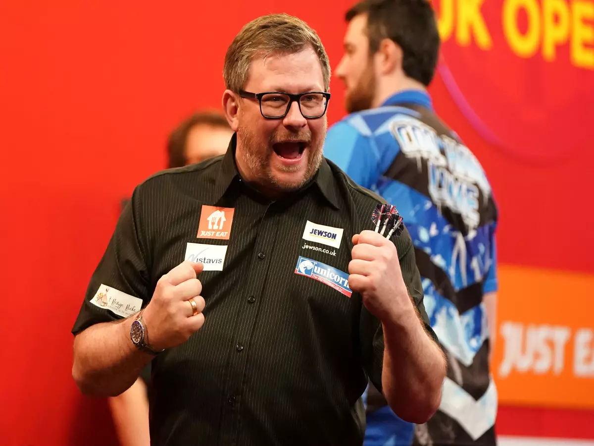 James Wade celebrates after winning the Ladbrokes UK Open 2021 tournament at the Marshall Arena, Milton Keynes during day three. Picture date: Sunday March 7, 2021.