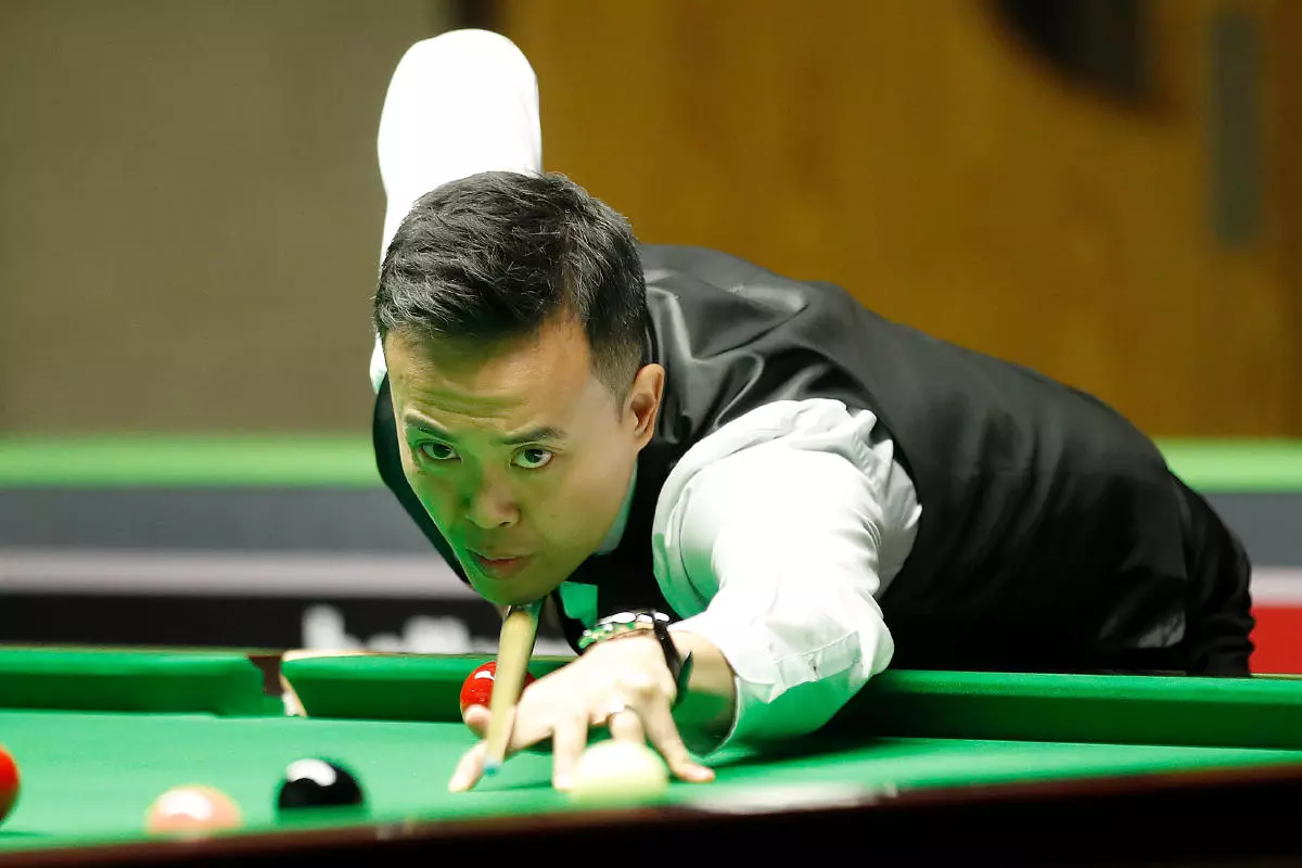 Marco Fu in action against Jack Lisowski during day eight of the Betway UK Championship at The York Barbican.