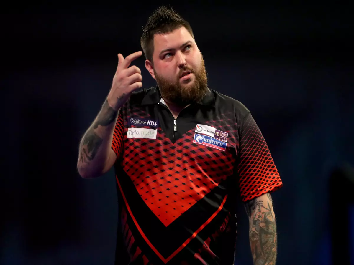 Michael Smith reacts against William O'Connor during day ten of the William Hill World Darts Championship at Alexandra Palace, London. Picture date: Monday December 27, 2021.