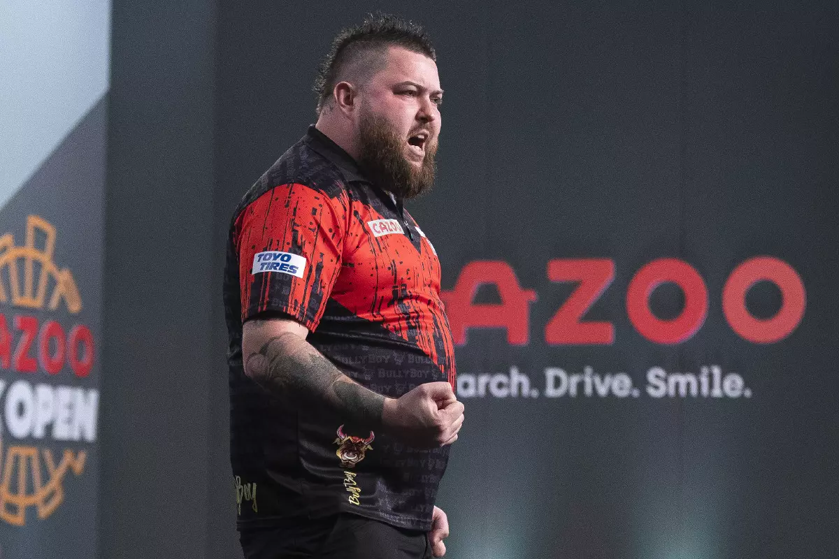 Michael Smith in action at the UK Open