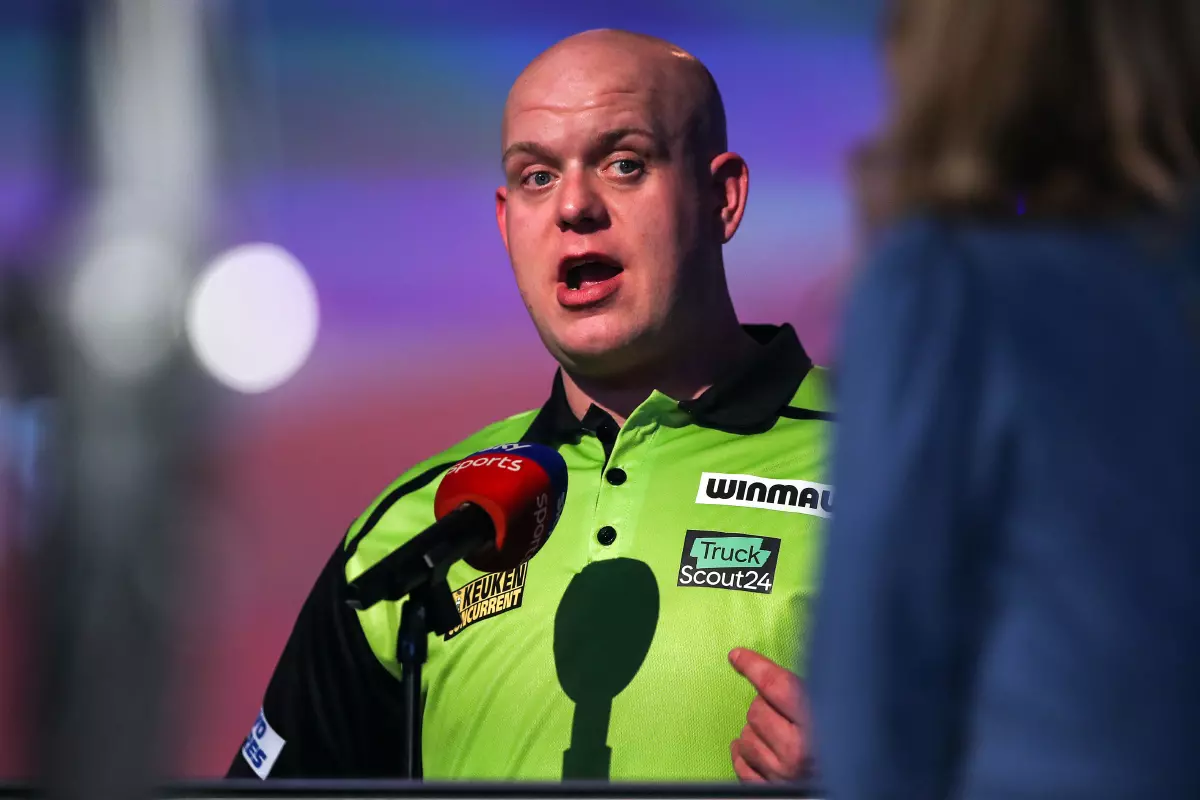 Michael van Gerwen talks to Sky Sports after beating Joe Cullen during day twelve of the William Hill World Darts Championship at Alexandra Palace, London.
