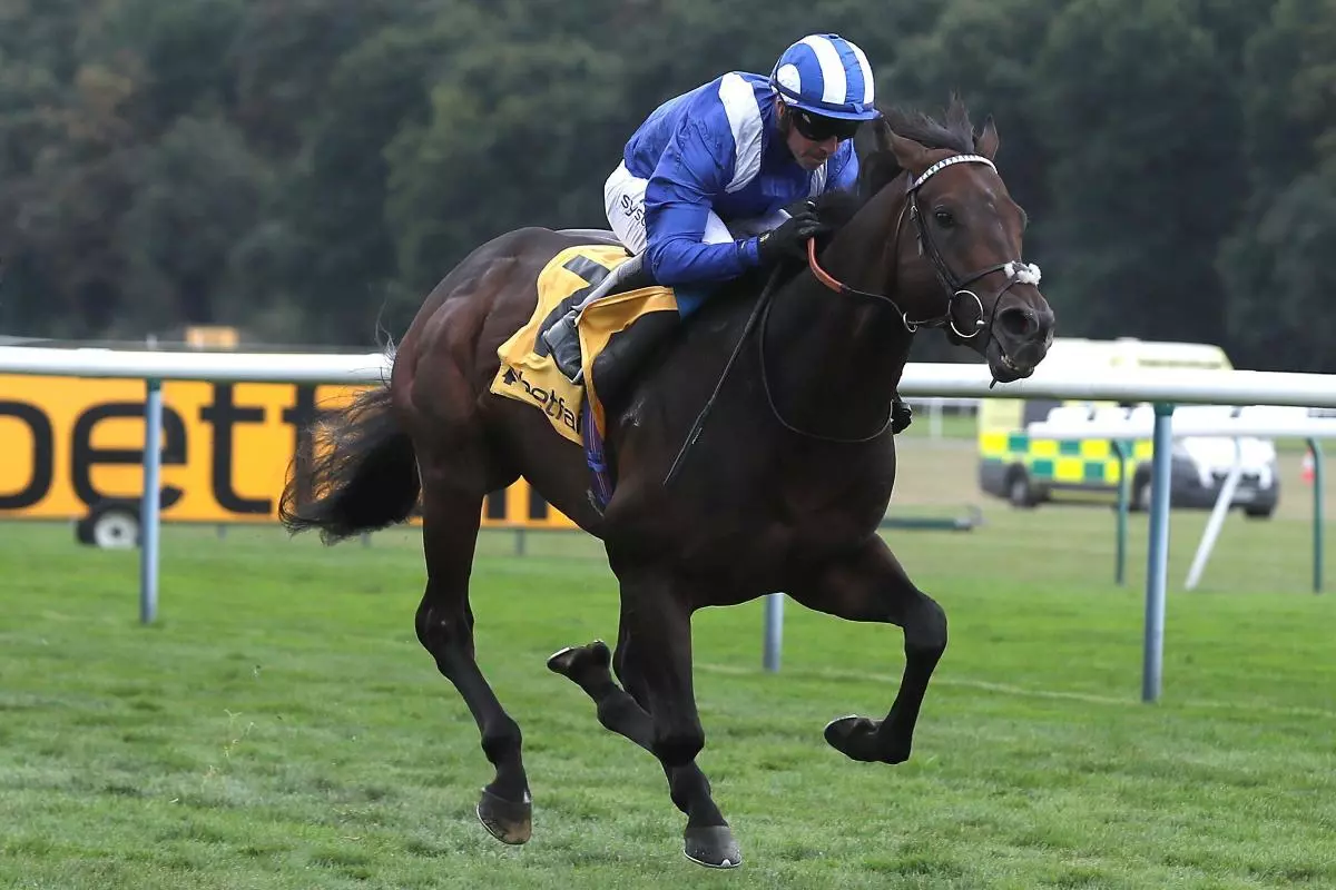Minzaal ridden by jockey Jim Crowley wins the Betfair Sprint Cup at Haydock Park