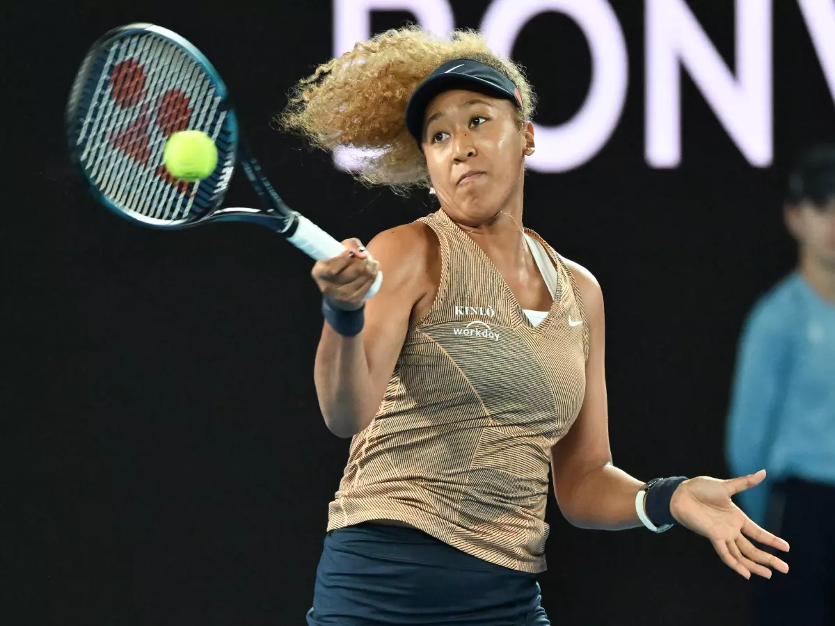 Naomi Osaka of Japan in action against Andrea Petkovic of Germany during their quarter final women's singles match at the WTA Melbourne Summer Set