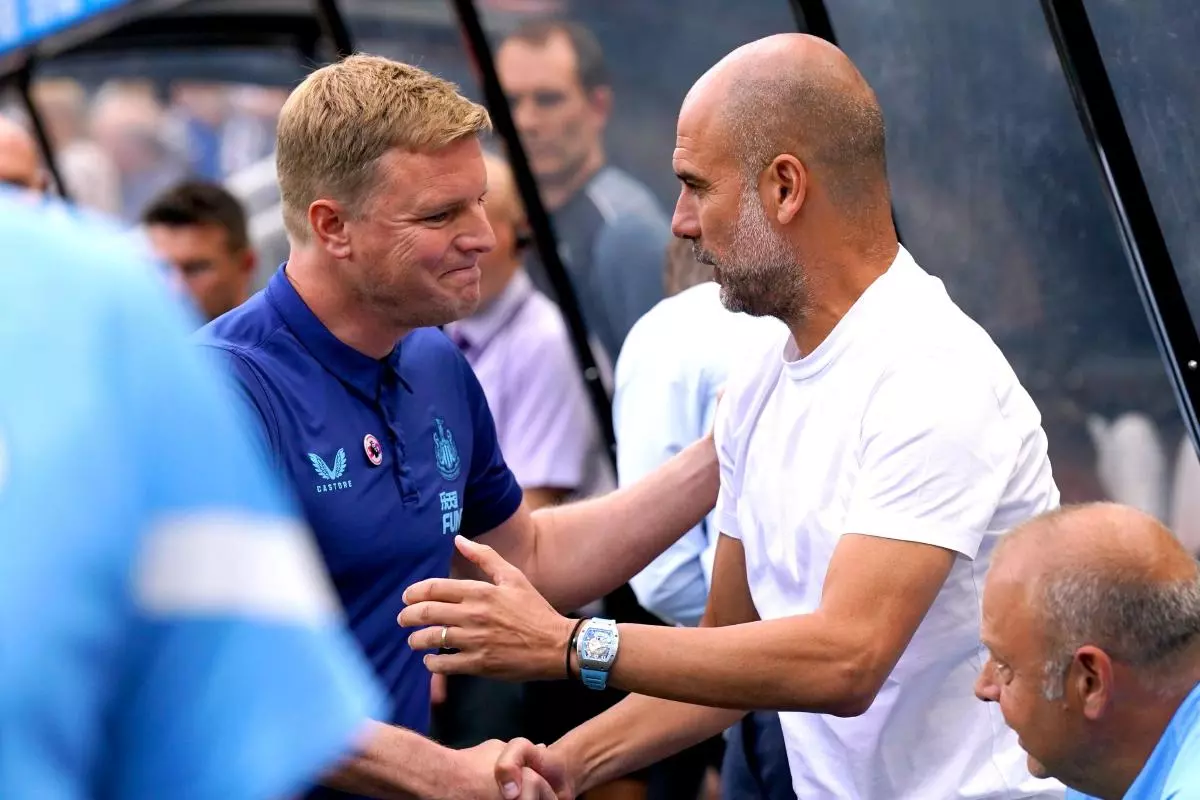 Newcastle United manager Eddie Howe (left) and Manchester City manager Pep Guardiola