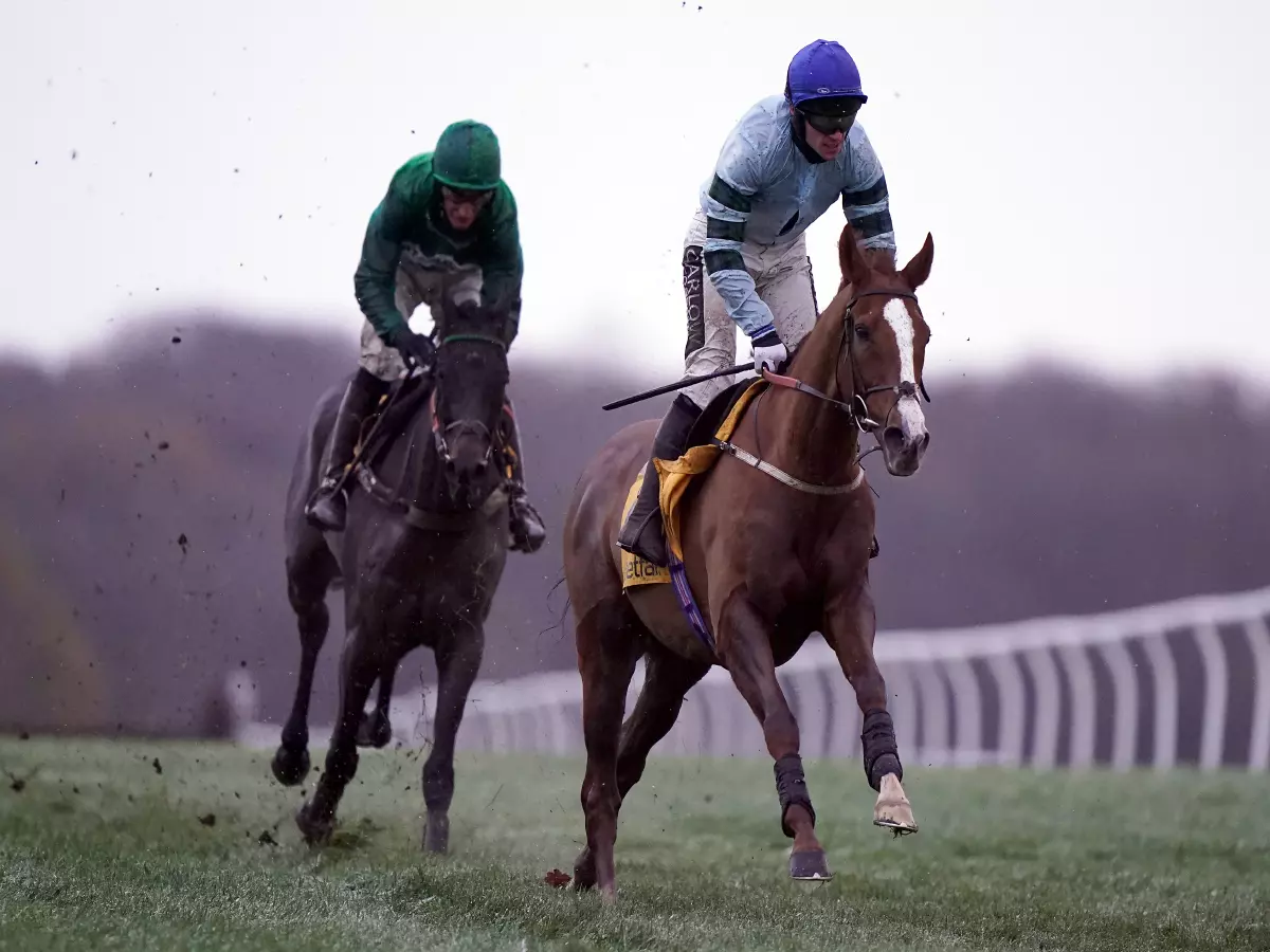 Not So Sleepy ridden by Jonathan Burke (right) after finishing in a photo finish with Epatante ridden by jockey Aidan Coleman at the end of the Betfair Fighting Fifth Hurdle during the Fighti