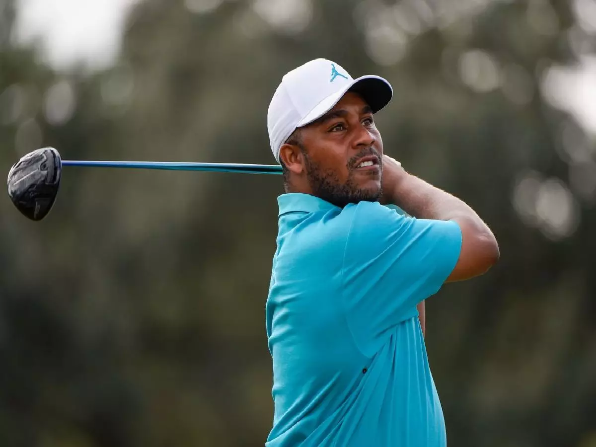Harold Varner III watches his tee shot on 16 during Rd1 of the HP Enterprise Houston Open