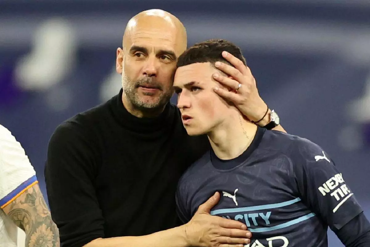 Pep Guardiola and Phil Foden