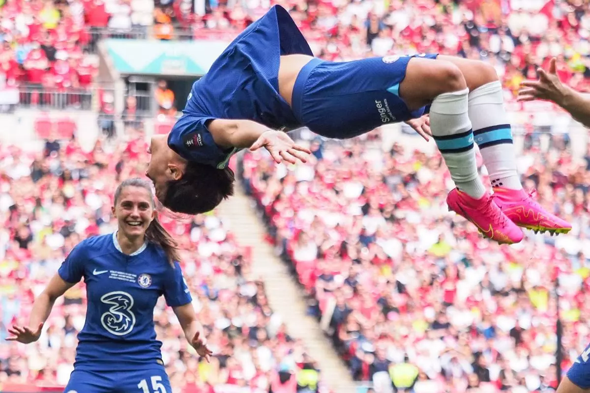 Sam Kerr celebrates after scoring