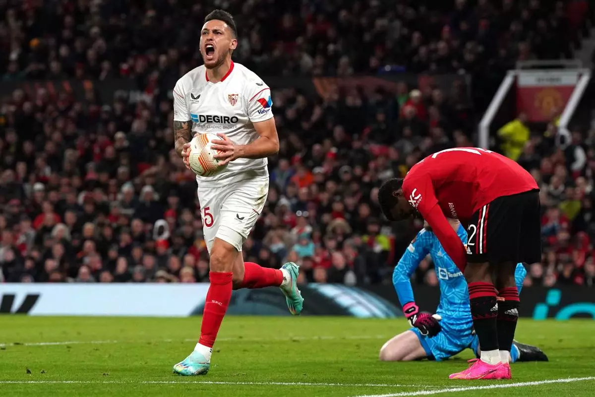 Sevilla's Lucas Ocampos celebrates their side's first goal of the game, an own goal against Manchester United
