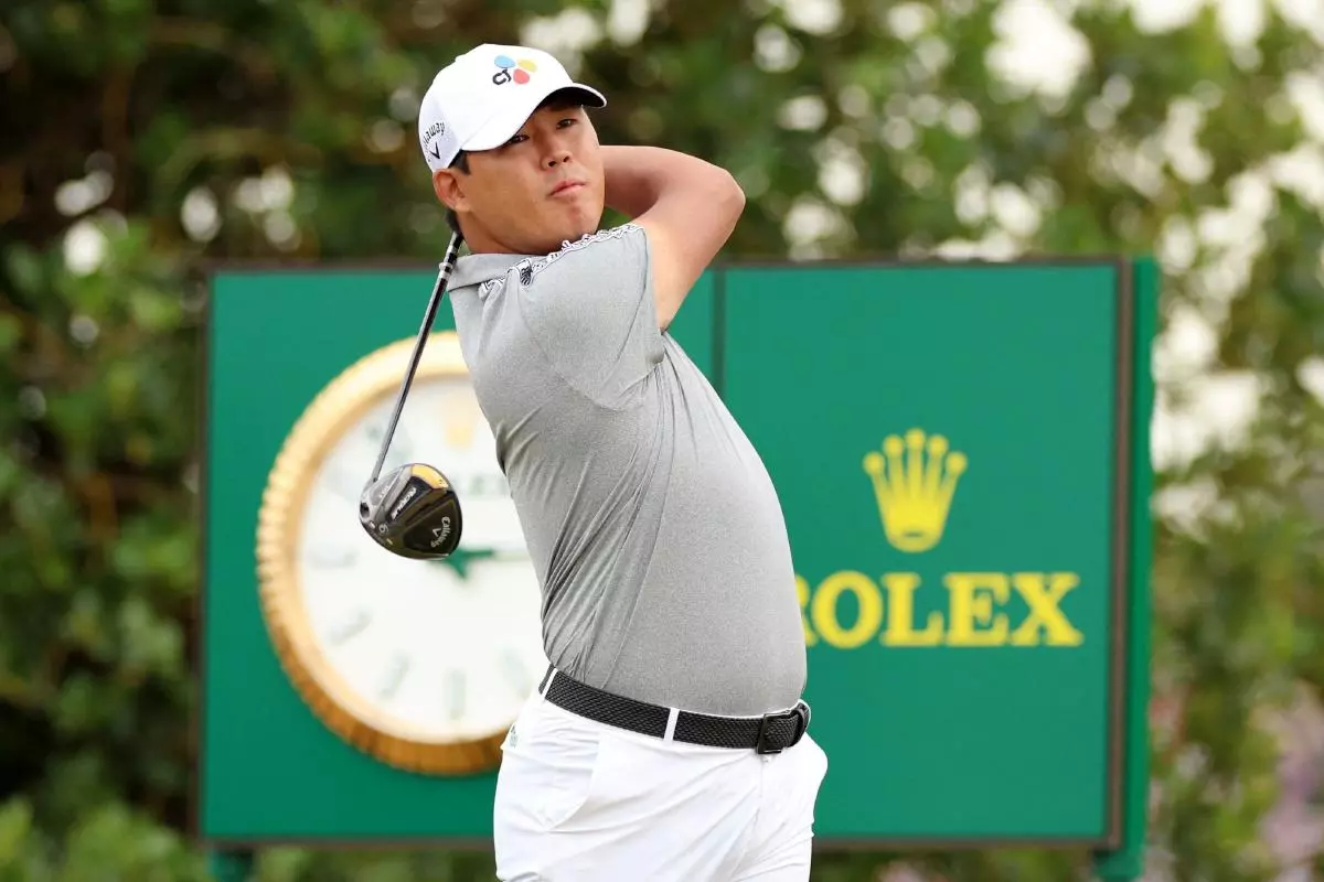 South Korea's Si-Woo Kim tees off