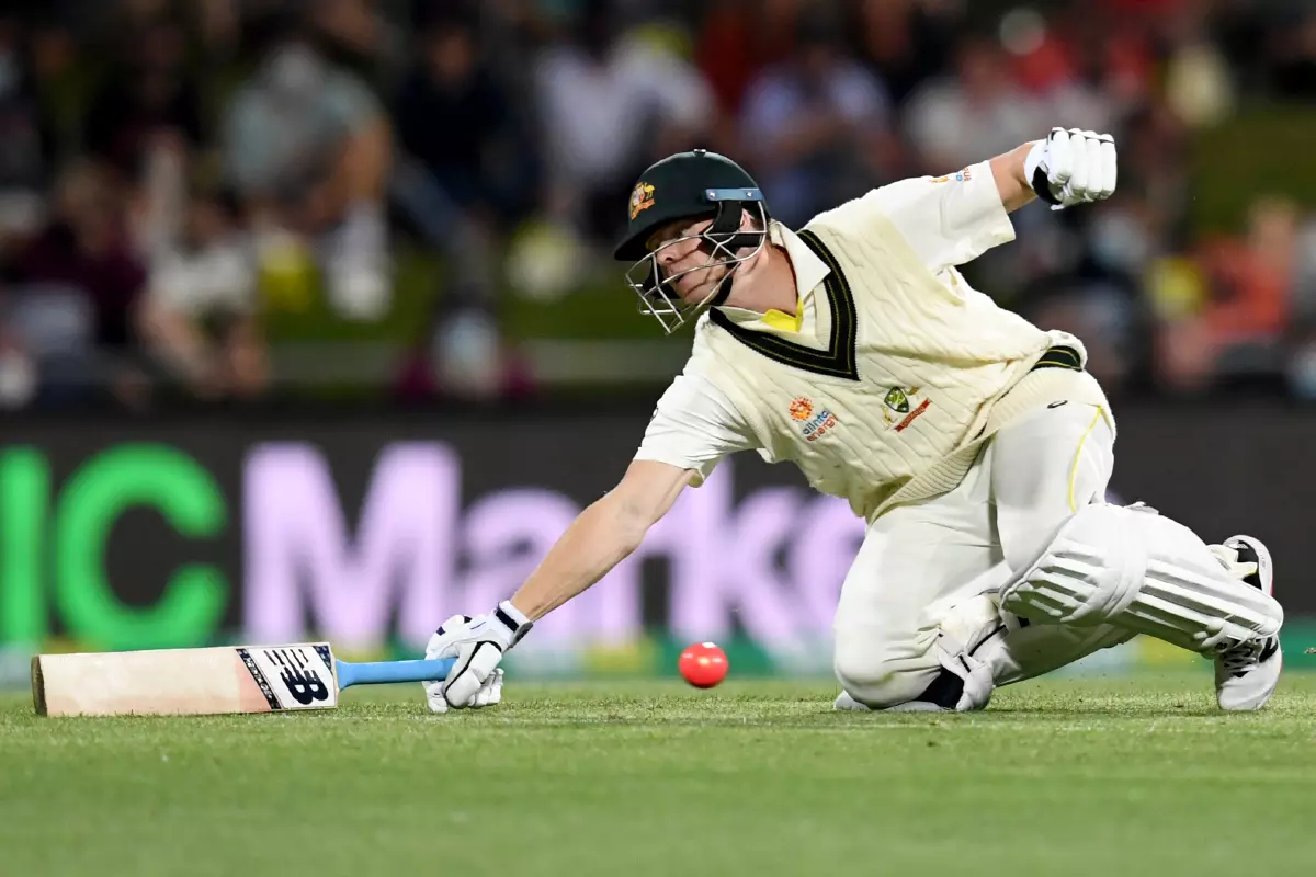 Steve Smith of Australia dives for his crease during Day 2 of the Fifth Ashes Test between Australia and England