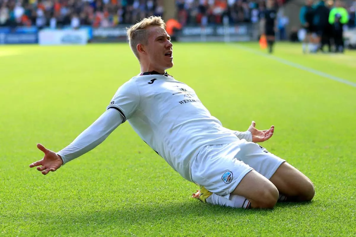 Swansea City's Ollie Cooper celebrates