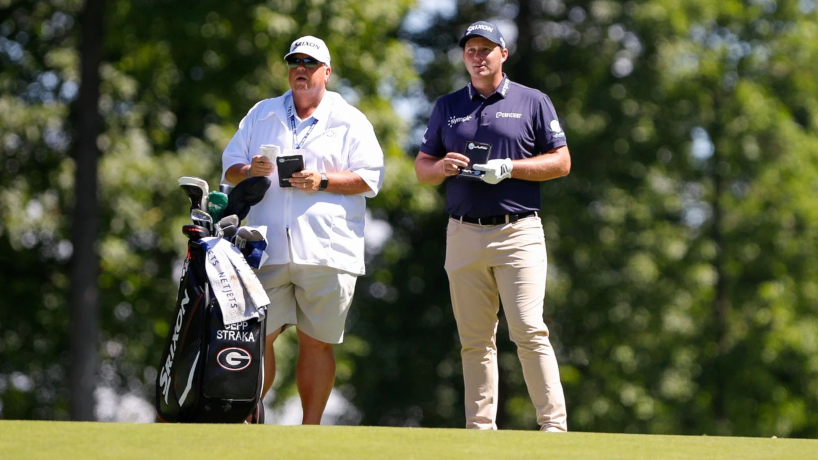 Sepp Straka with his caddy