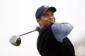 Winner: Tiger on his way to a second British Open victory in 2015