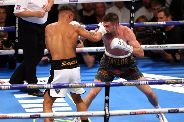 Josh Taylor (right) and Regis Prograis during the super-lightweight unification at the O2 Arena, London.