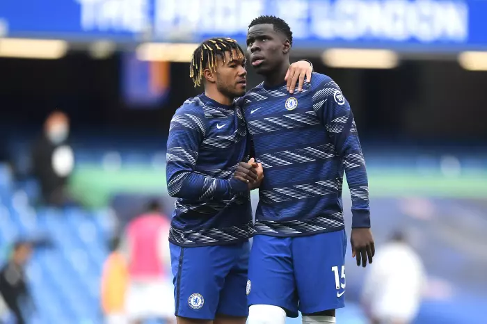 Chelsea's Reece James (left) and Kurt Zouma warming up prior to kick-off during the Premier League match at Stamford Bridge,