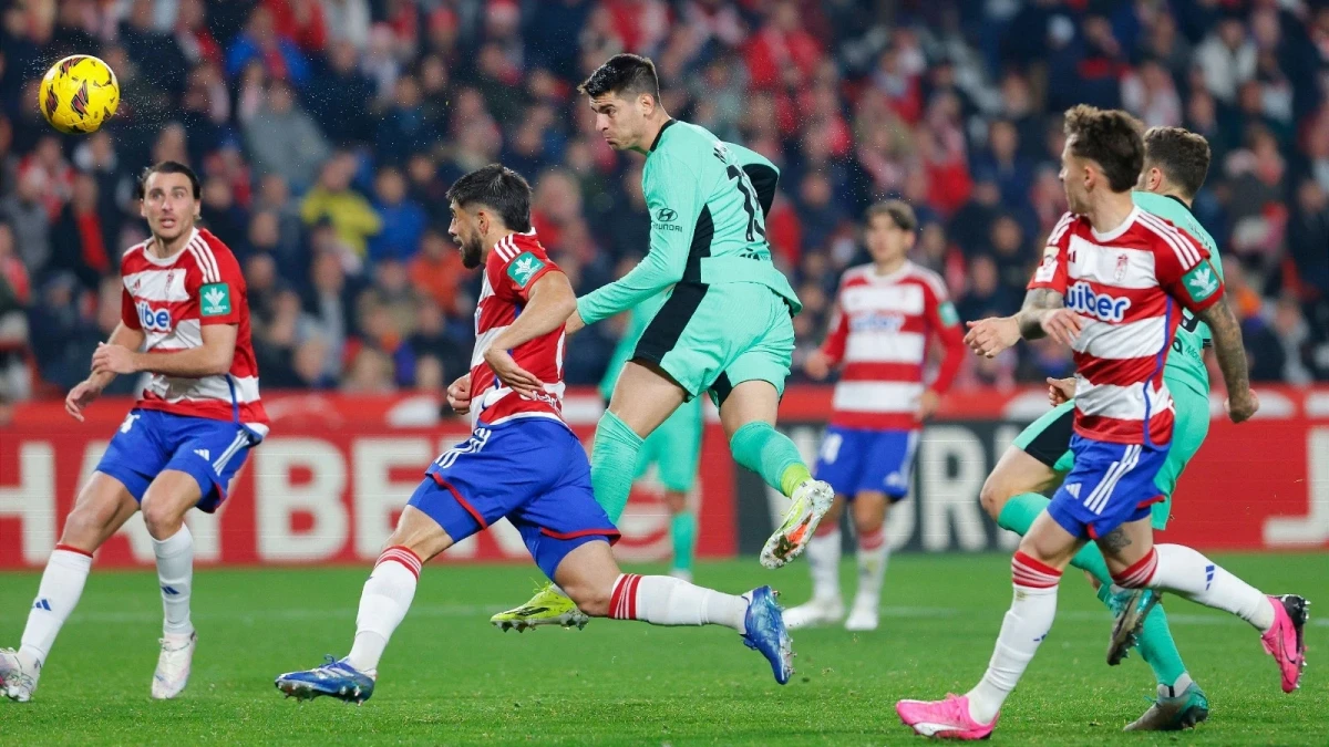 Alvaro Morata of Atletico Madrid scores