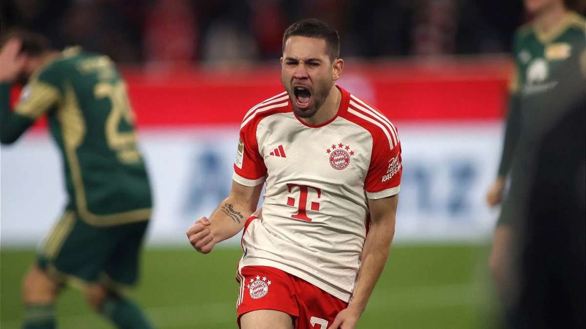 Raphael Guerreiro of Bayern Munich celebrates scoring