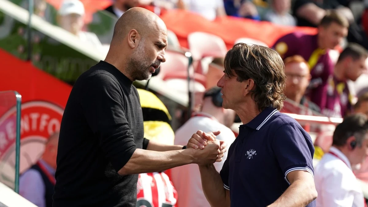 Pep Guardiola and Thomas Frank