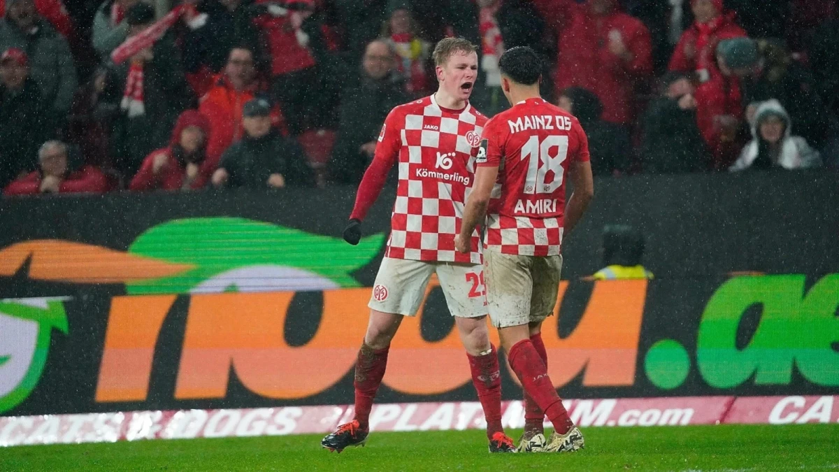 Jonathan Burkardt of Mainz celebrates scoring