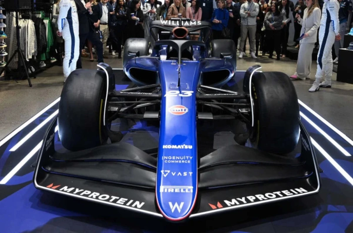 Williams Racing Formula One drivers Logan Sergeant (l) and Alex Albon (r) are interviewed during 2024 Season Launch - Feb 2024.jpg