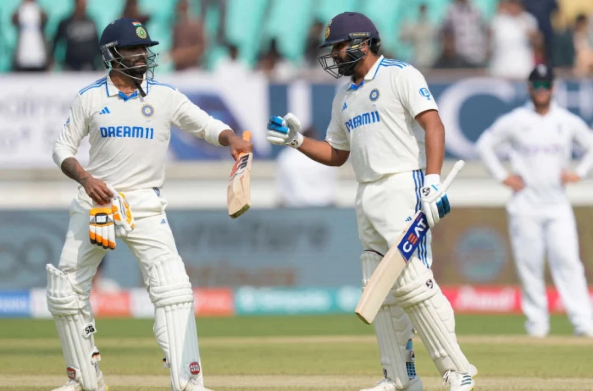 India's captain Rohit Sharma celebrates his century with teammate Ravindra Jadeja on the first day of the third cricket test match between India and England - Feb 2024