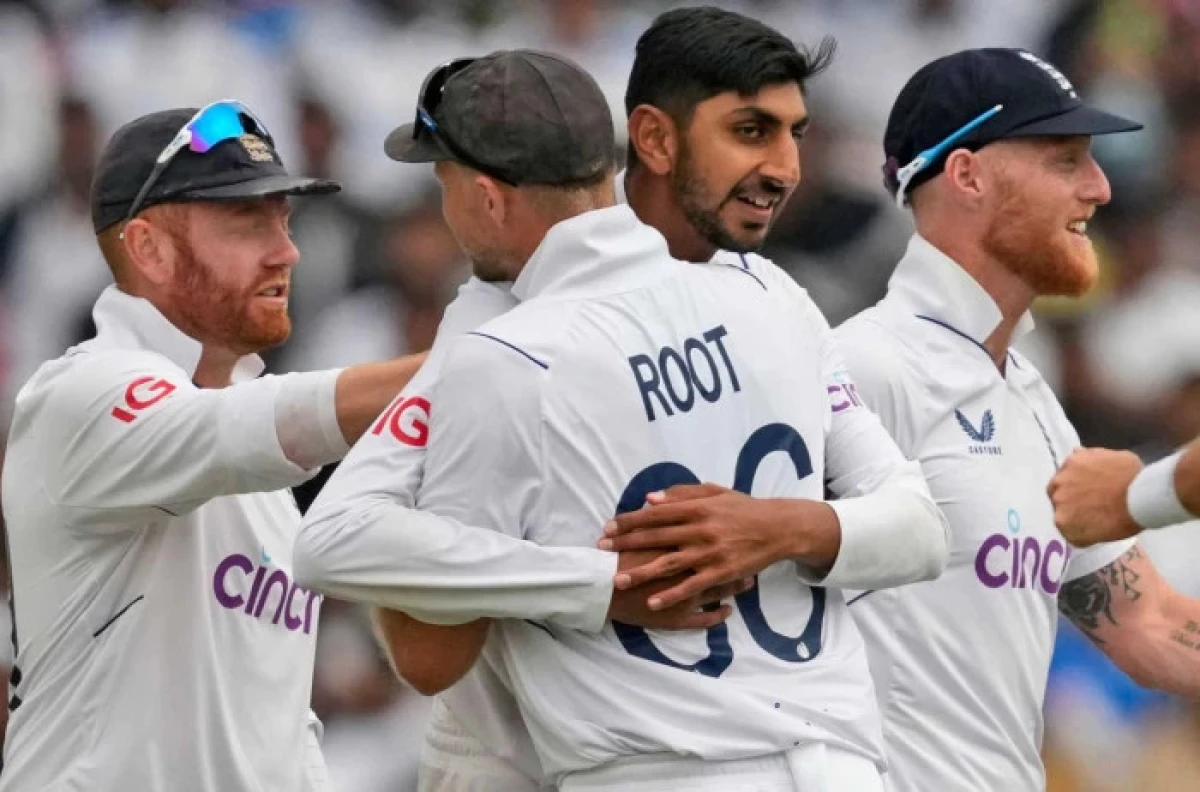 England's Shoaib Bashir, center, facing the camera, celebrates the wicket of India's Ravindra Jadeja - Feb 2024