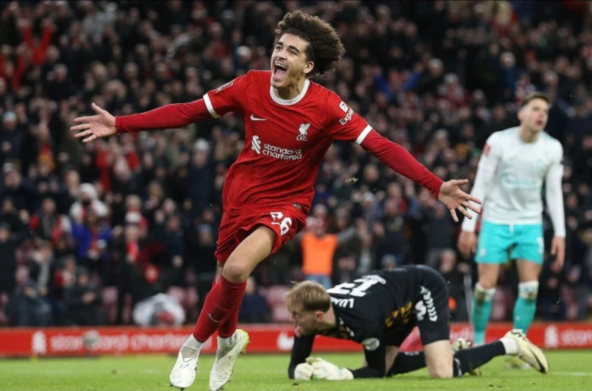 Jayden Danns of Liverpool celebrates after scoring