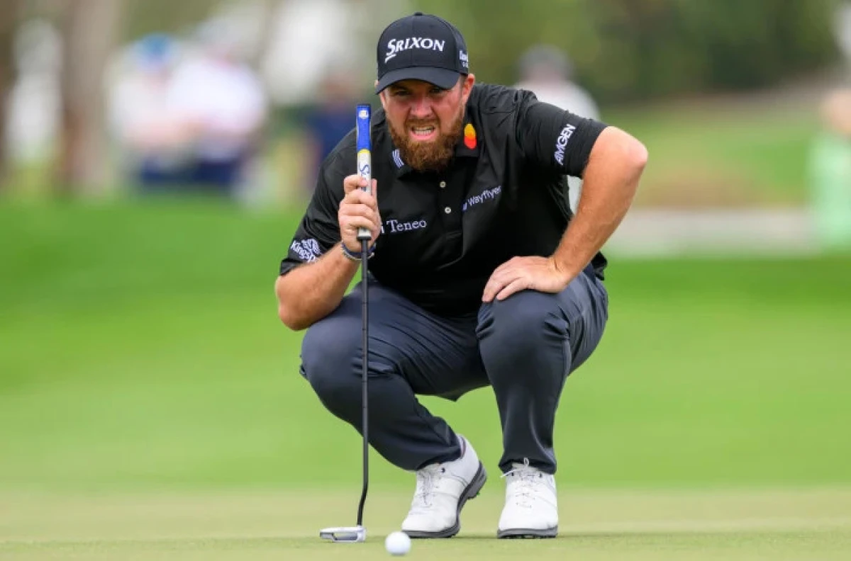 Shane Lowry of Ireland lines up his putt at the tenth hole during the third round of Cognizant Classic