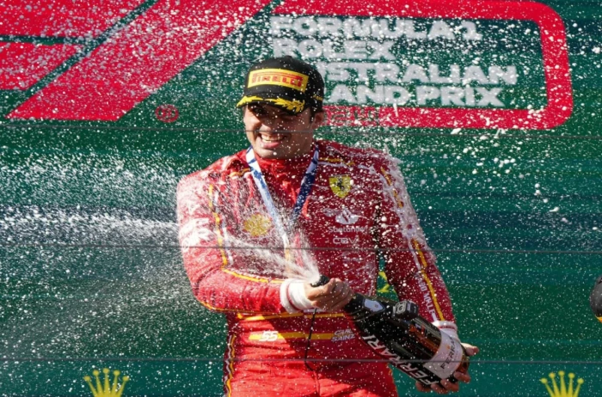 Ferrari driver Carlos Sainz of Spain sprays champagne after winning the Australian Grand Prix