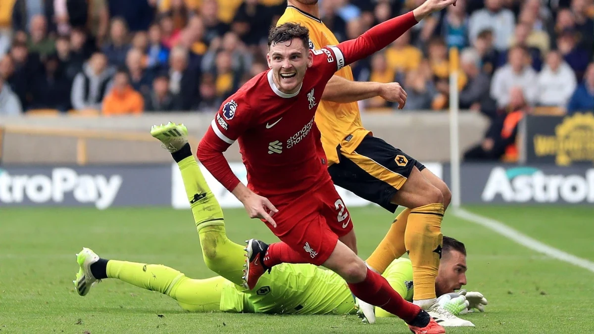 Andrew Robertson celebrates scoring for Liverpool