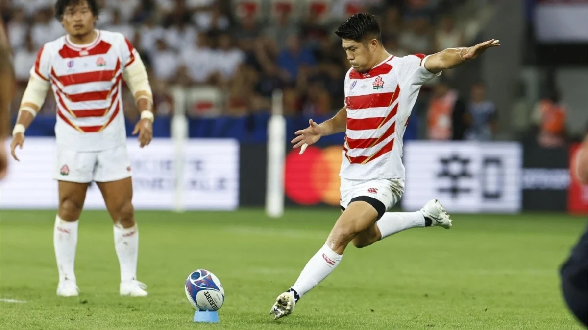 Rikiya Matsuda kicks a penalty goal for Japan,