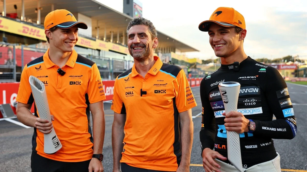Oscar Piastri, Andrea Stella and Lando Norris of McLaren